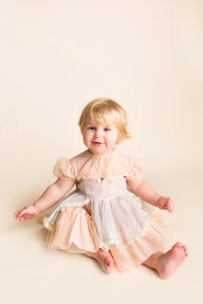 Little girl in one year in-home photo session