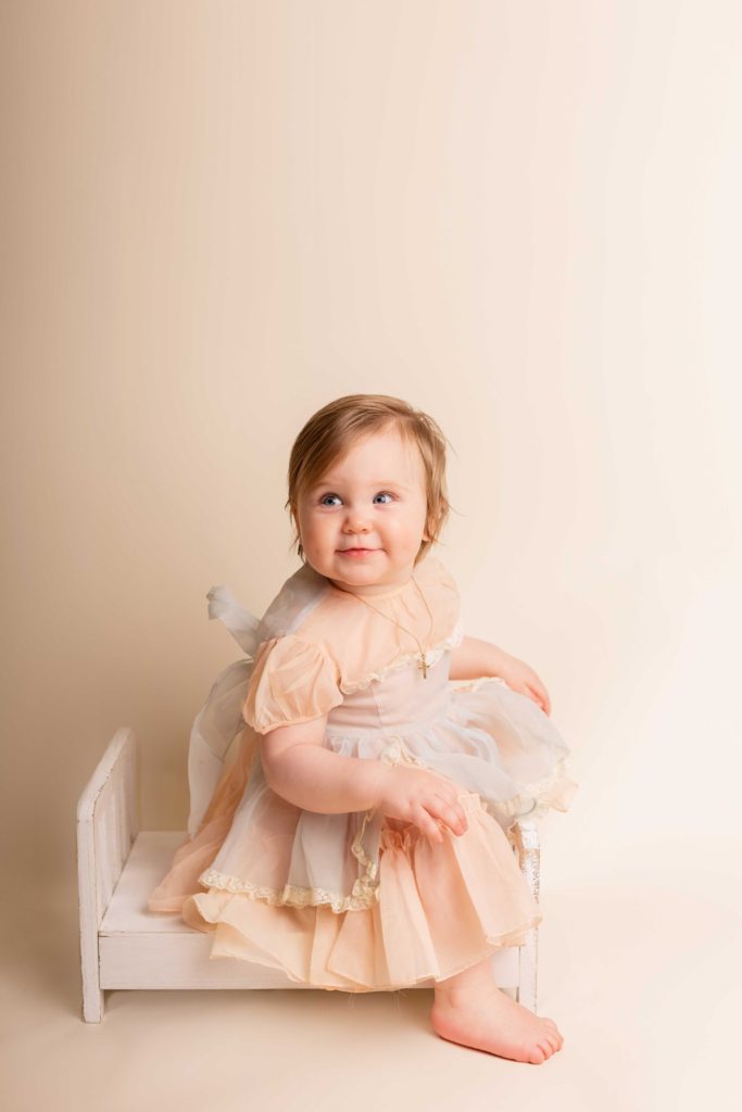Family Photographers Girl on Bench