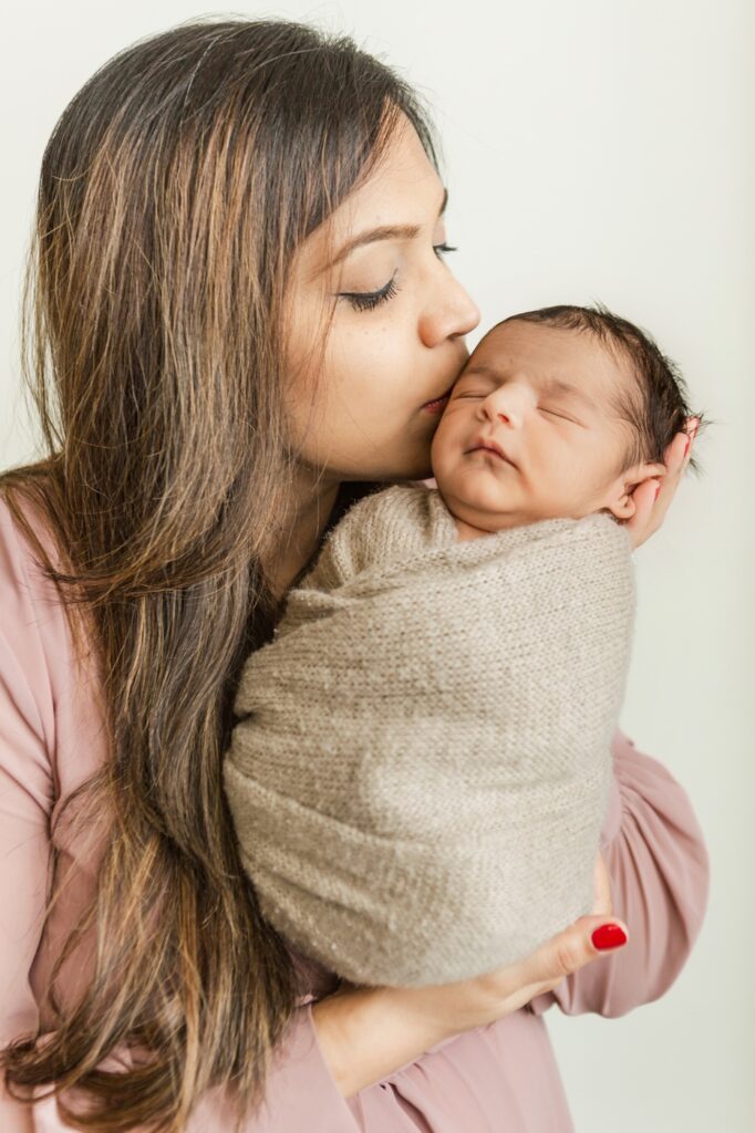 Newborn baby and mom photo