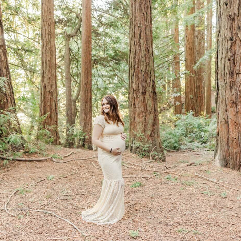 Maternity photo of woman in Oakland Redwood forest