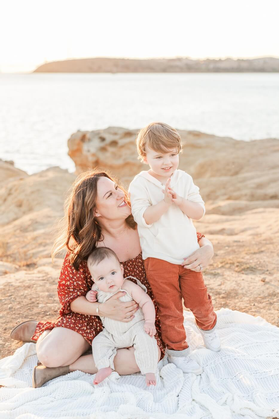 mom looking lovingly at her two boys by bay area family photographer